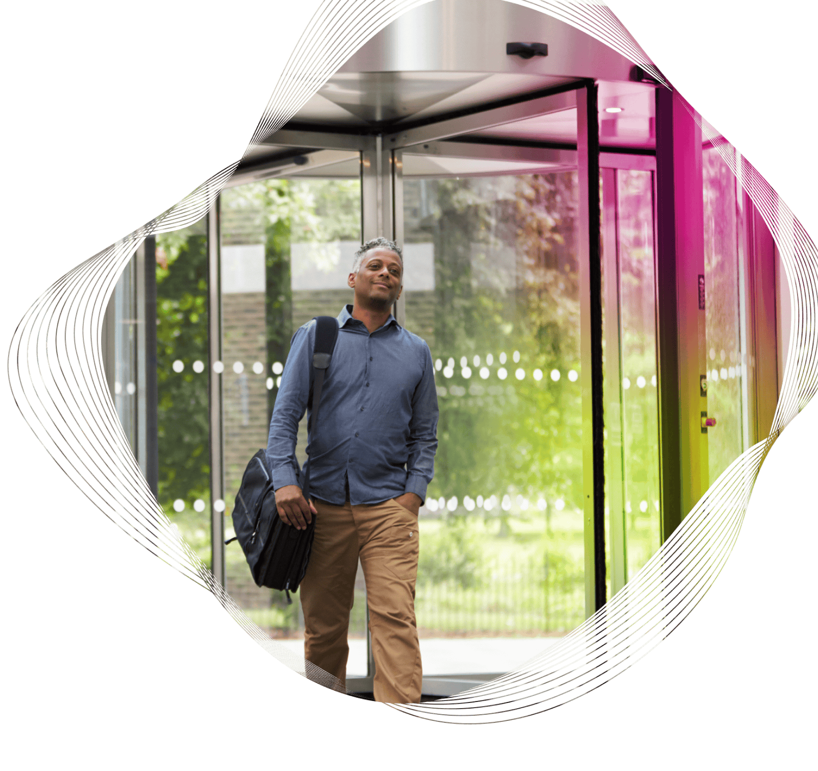 Man walking through a revolving door